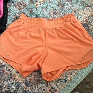 Orange 4” lulu hotty hot shorts
